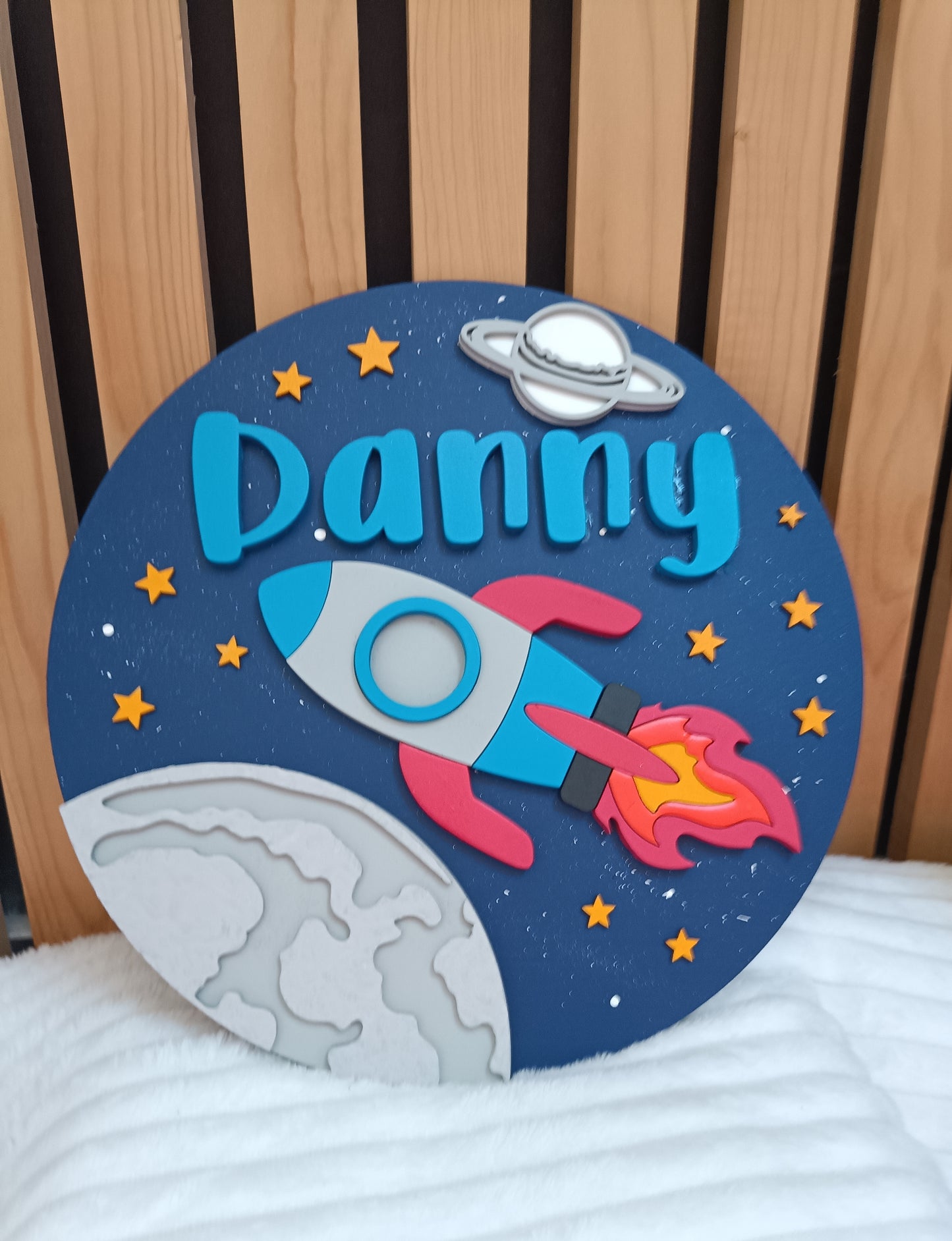 Space themed hanging sign