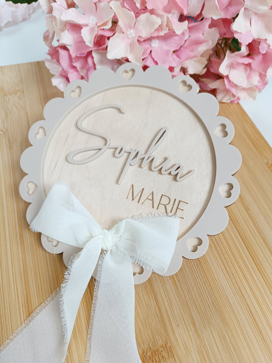 Scalloped name sign